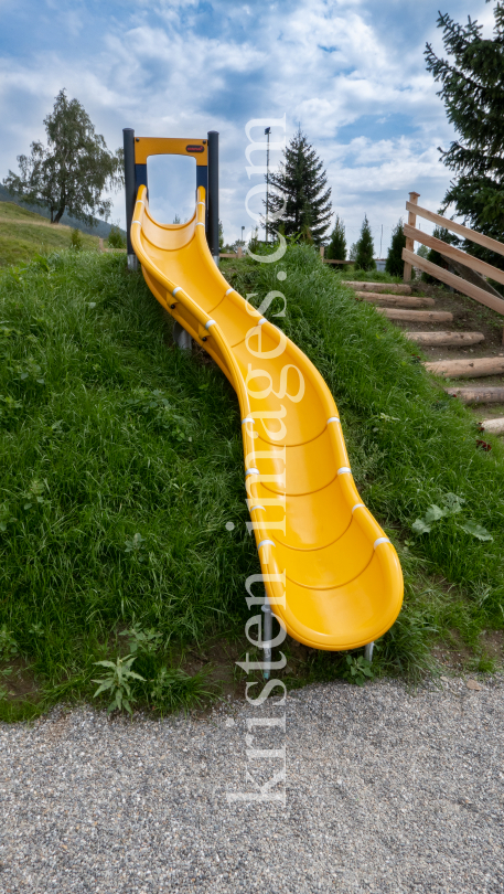 Rutsche, Spielplatz / Patsch, Tirol, Austria by kristen-images.com