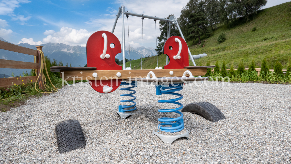 Federwippe, Spielplatz / Patsch, Tirol, Austria by kristen-images.com