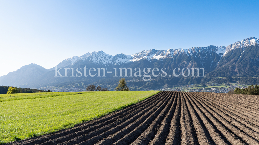Wiese, Acker in Aldrans, Tirol, Austria by kristen-images.com