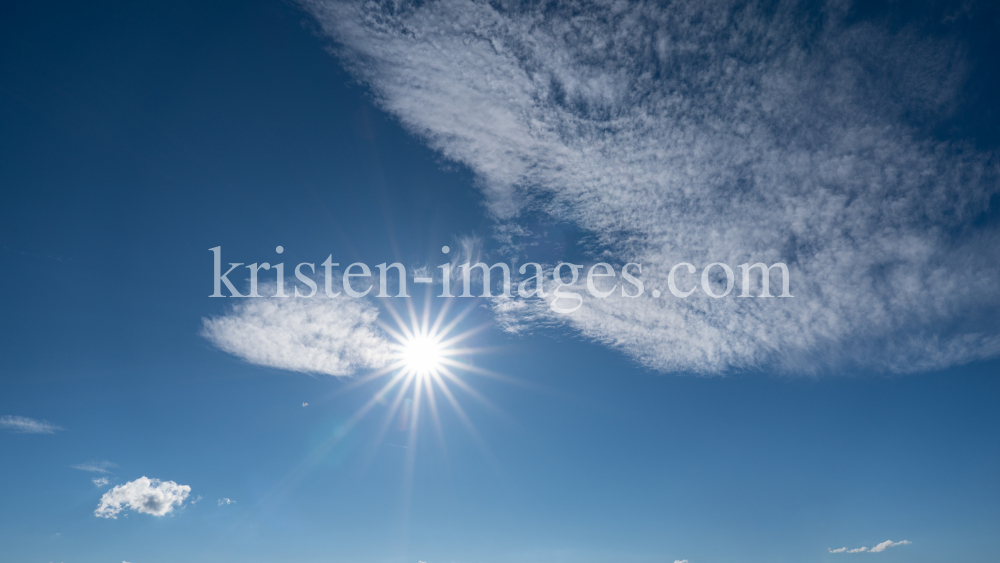 Föhnwolken, Sonne / Himmel über Tirol, Austria  by kristen-images.com