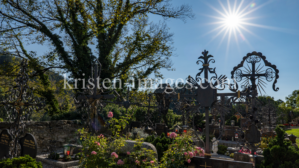Friedhof der Pfarrkirche Johannes der Täufer in Ampass, Tirol, Austria by kristen-images.com