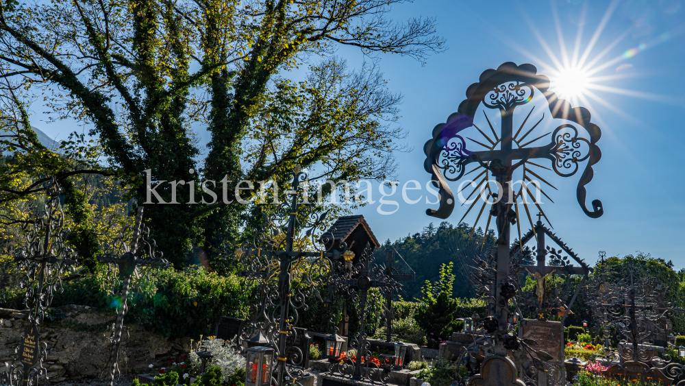 Friedhof der Pfarrkirche Johannes der Täufer in Ampass, Tirol, Austria by kristen-images.com