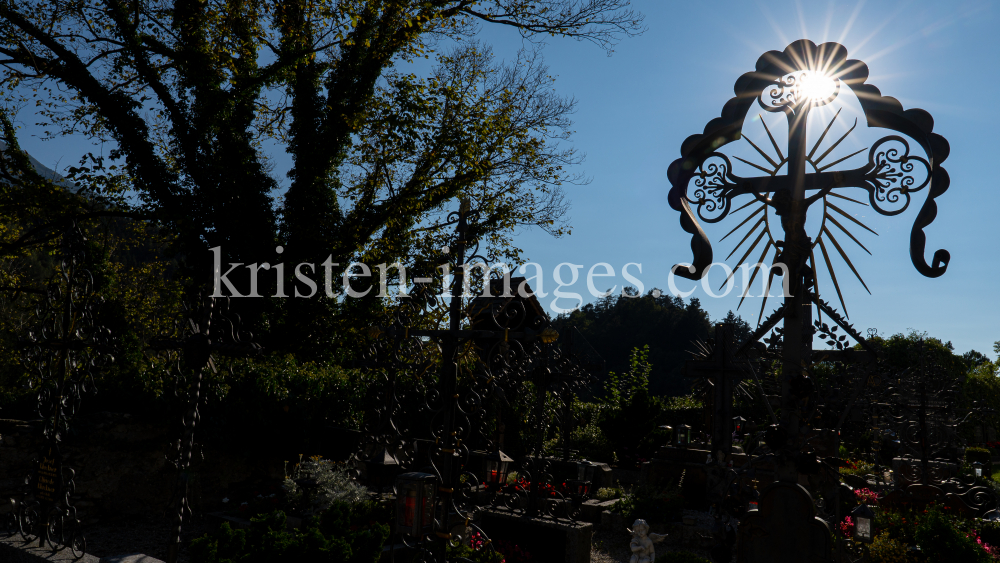 Friedhof der Pfarrkirche Johannes der Täufer in Ampass, Tirol, Austria by kristen-images.com