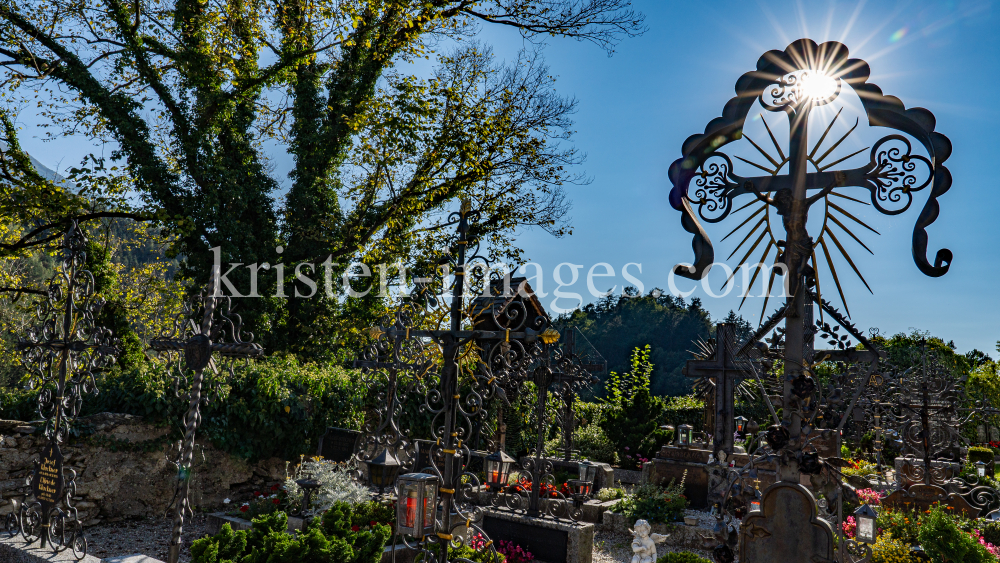 Friedhof der Pfarrkirche Johannes der Täufer in Ampass, Tirol, Austria by kristen-images.com