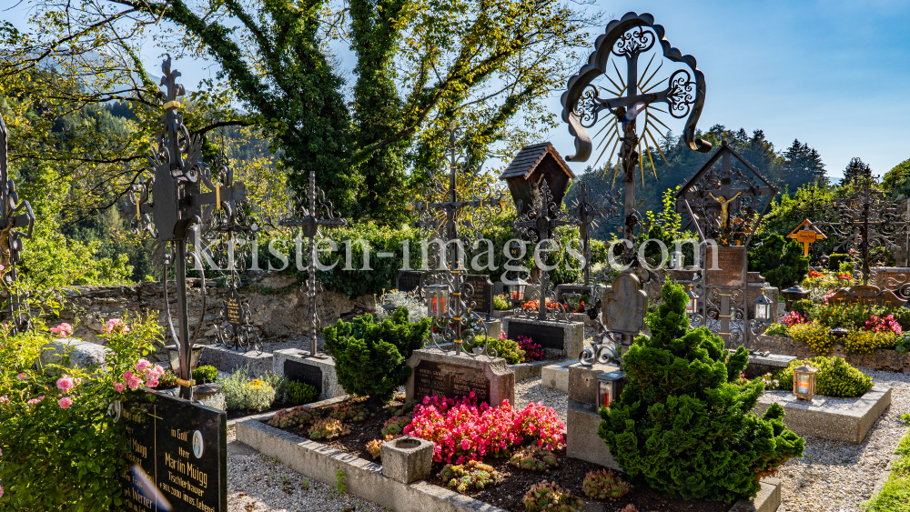 Friedhof der Pfarrkirche Johannes der Täufer in Ampass, Tirol, Austria by kristen-images.com
