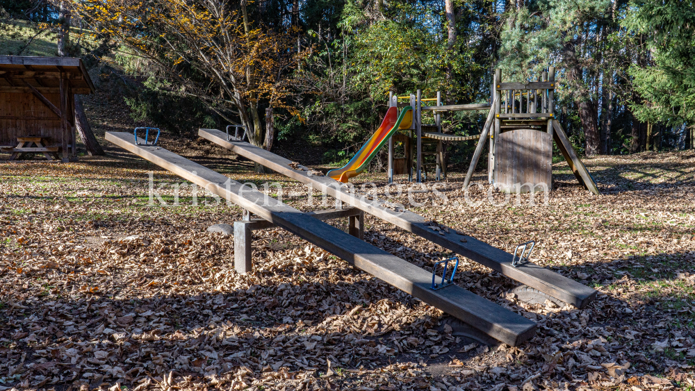 Spielplatz im Herbst in Igls, Gsetzbichl, Innsbruck, Tirol, Austria by kristen-images.com