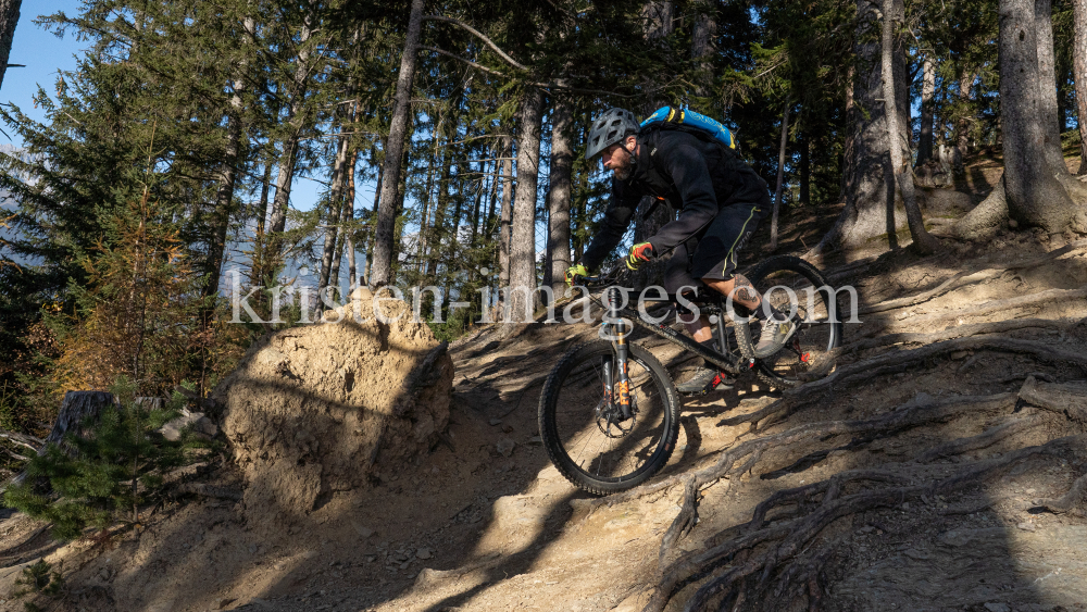 Mountainbiker, Downhiller /  Viller Kopf, Paschberg, Vill, Innsbruck, Tirol, Austria by kristen-images.com