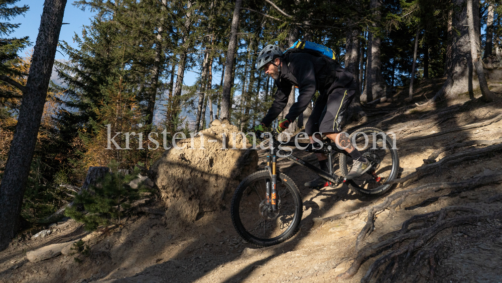 Mountainbiker, Downhiller /  Viller Kopf, Paschberg, Vill, Innsbruck, Tirol, Austria by kristen-images.com