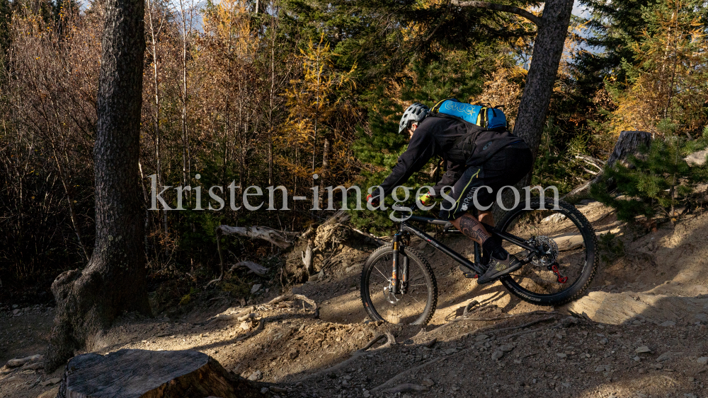 Mountainbiker, Downhiller /  Viller Kopf, Paschberg, Vill, Innsbruck, Tirol, Austria by kristen-images.com