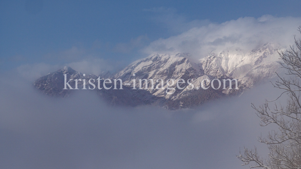 Nordkette im Nebel, Innsbruck, Tirol, Austria by kristen-images.com