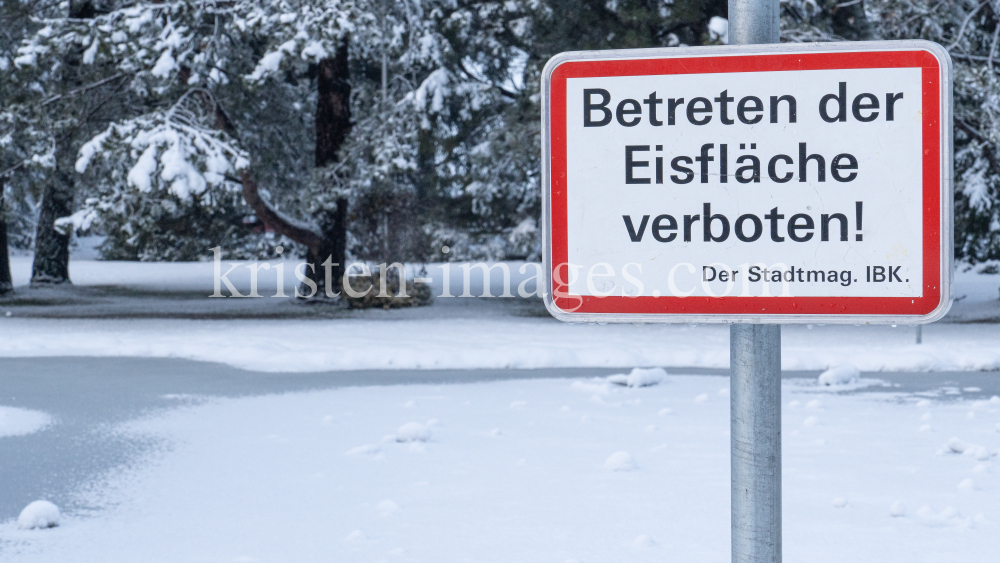 zugefrorener Teich im Kurpark Igls, Innsbruck, Tirol, Austria  by kristen-images.com