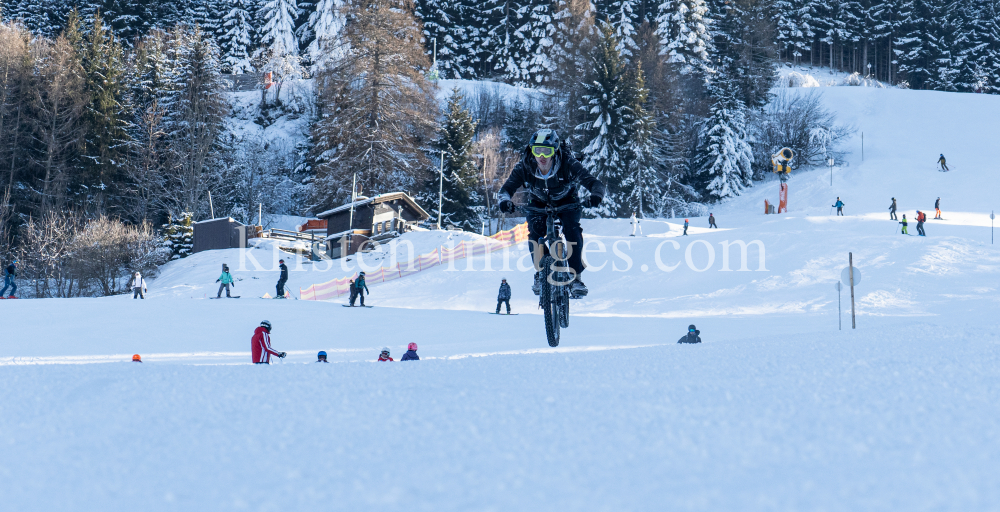 Mountainbiker auf Skipiste / Patscherkofel, Innsbruck, Tirol, Austria by kristen-images.com