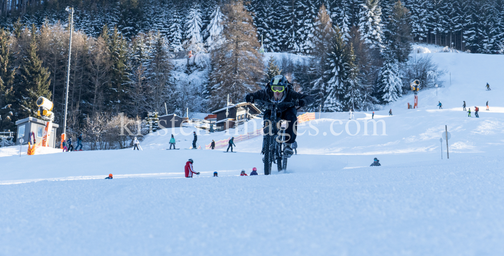 Mountainbiker auf Skipiste / Patscherkofel, Innsbruck, Tirol, Austria by kristen-images.com