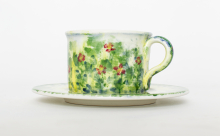 blumenbemalte Tasse mit Untertasse