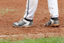 Baseballschuhe, Schuhe im Baseball Sand