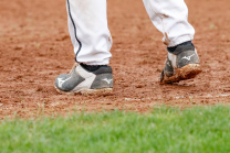 Baseballschuhe, Schuhe im Baseball Sand